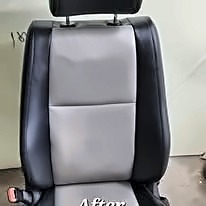 Restored car seat in black and grey leather