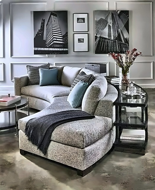 Custom curved sectional in lifestyle living room with art