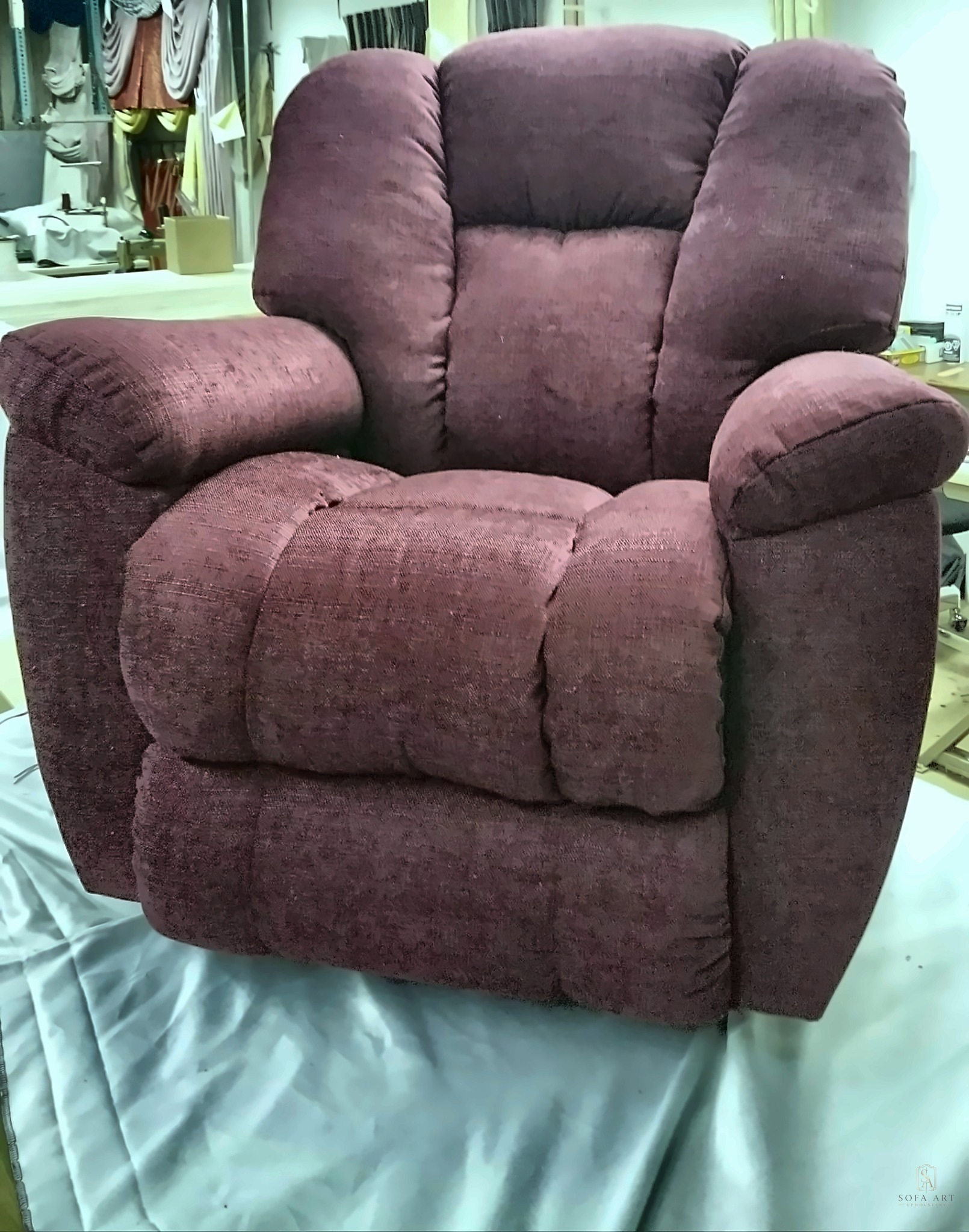 Burgundy fabric reclining chair