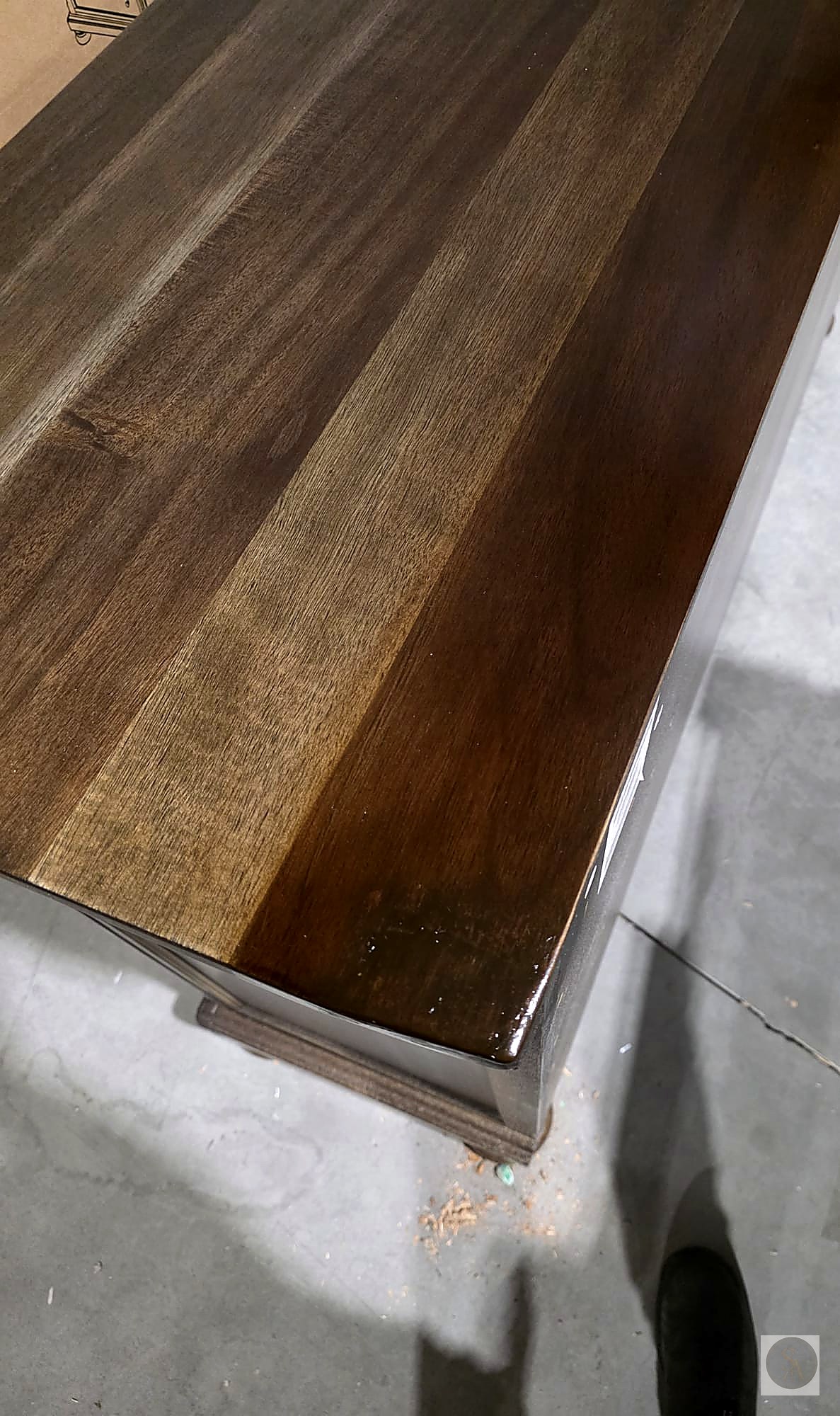 Wood cabinet after corner repair and refinish